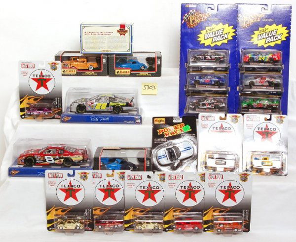 Racing Champions, Hot Wheels, Ertl, others: Racing Champions, Hot Wheels, Ertl, Eagle Collectibles, Matchbox, Maisto and Winners Circle diecast race cars in original boxes, cars look C9-10. Boxes show little wear.