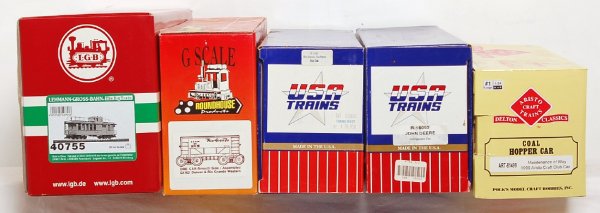 Five G scale, LGB, USA Trains, Roundhouse, Aristo: G scale, LGB 40755 D&RGW Pagosa Springs baggage and express caboose number 215. USA Trains R-16053 John Deere reefer and R-1906 RGS boxcar. Roundhouse G4162 D&RGW ore car smooth side assembled. Aristo
