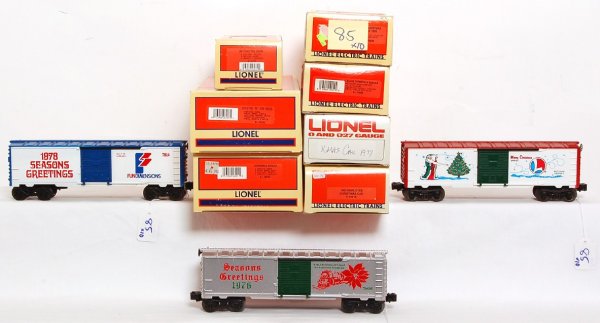 Ten Lionel Christmas boxcars, most in OB 