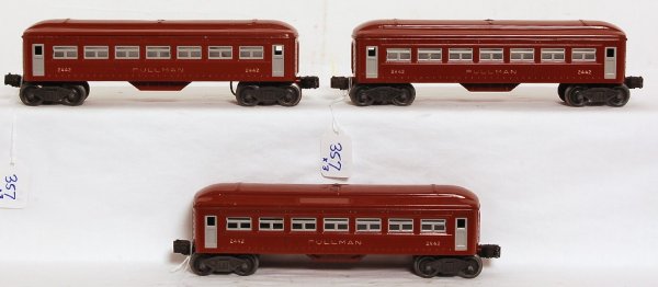 Three Lionel postwar 2442 Pullman passenger cars