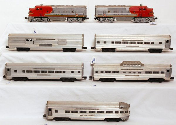 Lionel 2343 S.F. F3, 2530, 2531, 2532, 2533, 2534: Lionel 2343 Santa Fe F3 diesel AA units with screened roof vents, no missing porthole lens. 2530 REA baggage with dot head rivet name plates, 2531, Silver Dawn observation with round head rivet name p