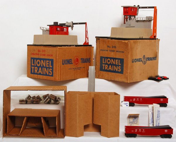 Lionel No. 342 loader and No. 345 unloader in OB: Lionel 342 culvert loader in original box with inserts, 6342 gondola, No. 90 controller, seven culverts and original instructions sheet, base of loader has some layout paint, otherwise C7. Box is very