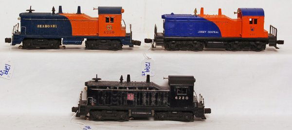 Lionel 611, 6250, 6220 NW-2 diesel switchers: Lionel 611 Jersey Central, 6250 decaled Seaboard, 6220 small decal A.T.S.F, NW-2 diesel switchers, 611 has hairline at bottom of screw, otherwise locos should clean C6-7.