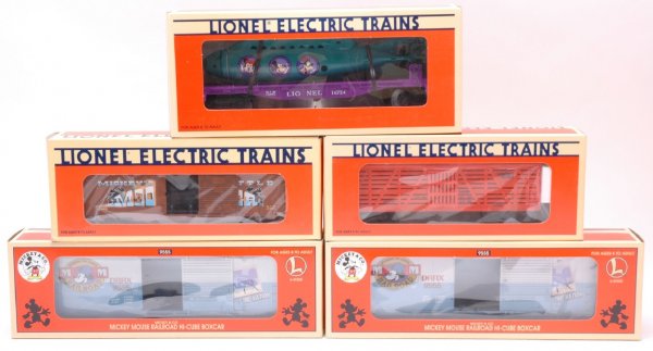 Lionel Disney 16686 16724 29205 Bugs 16690 MIB: Lionel four Disney freight cars; 16686 Mickey with Bad Pete animated boxcar, 16724 Mickey submarine car and two 29205 Mickey Mouse Railroad hi-cube boxcars. Also included is 16690 Bugs Bunny with Yose