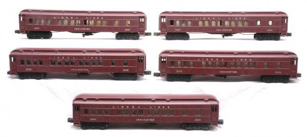 Lionel five 2625 Irvington Pullmans: Lionel postwar five 2625 Irvington Pullmans; one Pullman is C7. One car has a small chip in corner by step. All steps are intact on cars, C6.