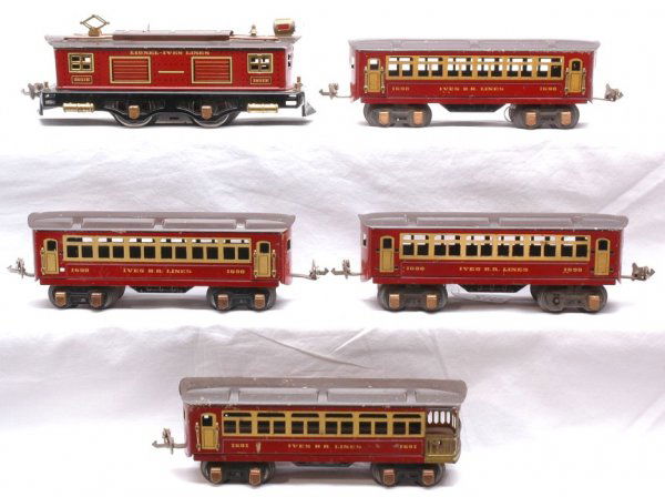 Ives 1651E 1690 1691 Lionel Ives Lines Pass Set: Ives prewar O gauge 1651E box cab 0-4-0 electric loco marked LIONEL IVES LINES, three 1690 Pullmans and 1691 observation. The passenger cars are lithographed and marked IVES RR LINES. The passenger ca