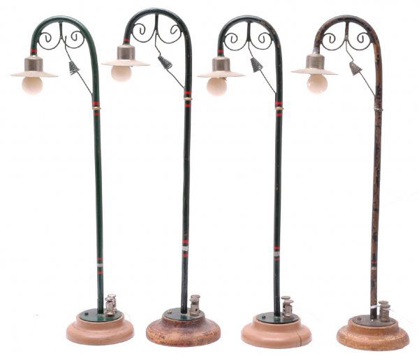 Marklin Prewar 1 Gauge four 3453-1 Street Lamps: Marklin prewar 1 gauge four 3453-1 street lamps. One lamp post is C5, one is C6 and the other two have been restored..