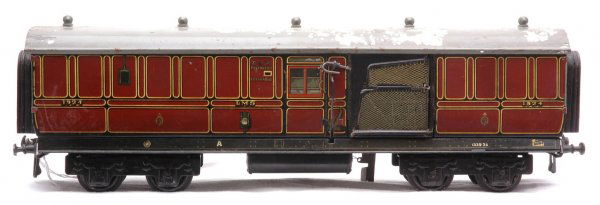 Bassett Lowke Carette Tooling LMS TPO Mail Pickup: Bassett Lowke from Carette tooling prewar O gauge LMS TPO mail pickup car with paint flaking on roof. Body is C6.