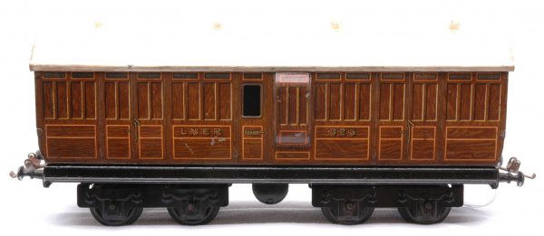 Bassett Lowke Carette Tooling LNER Luggage Van: Bassett Lowke from Carette tooling O gauge LNER luggage van with Ives couplers. Roof has been poorly repainted and car body is C6.