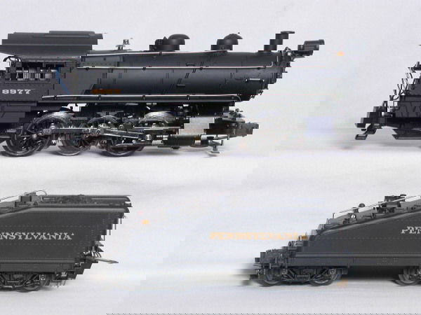 Lionel 18000 Pennsylvania B-6 0-6-0 and tender OB: Lionel 18000 Pennsylvania B-6 0-6-0 and tender, RailSounds, C10 in OB, includes paperwork and sound control button.
