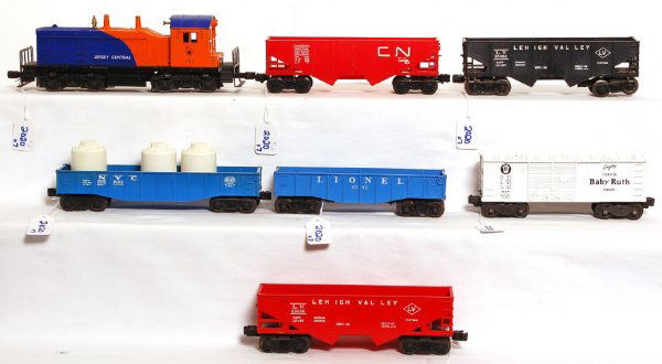 Lionel 611, 6042, 6014, 6476, 6476, 9013, 6162: Lionel 611 Jersey Central NW-2 switcher, 6042 gondola, 6014 Baby Ruth boxcar, 6476 Lehigh Valley hopper, 6476 Lehigh Valley, 9013 Canadian National, 6162 NYC gondola with canisters unrun, 611 has chip