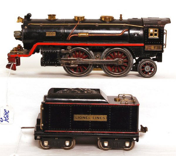 Lionel S.G. 390 2-4-2 loco and 390T tender: Lionel standard gauge 390 2-4-2 steam loco and 390T tender, loco is missing pilot truck assembly, wheels have casting fatigue and is missing some trim, otherwise lower C6. Tender looks nicer, C6+.