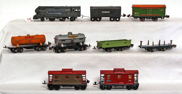 Lionel 1688, tender, 805, 1680, 654, 902, more: Lionel prewar 1688 2-4-2 loco and tender, 805 boxcar, 1680 Shell tank car, 654 Sunoco tank car, 902 gondola, 831 flatcar, 807 caboose and 657 caboose. Some cars are repainted. Please view our photogra