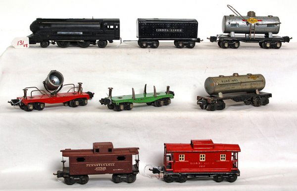Lionel 1688, 1689T, 2654, 2651, 1680, 2672, more: Lionel prewar 1688 2-4-2 loco, 1689T tender with 2620 searchlight car, 2654 Sunoco tank car, 2651 flatcar, 1680 Sunoco tank car, 2672 Pennsylvania caboose and 2657 caboose. Tender is repainted, some m