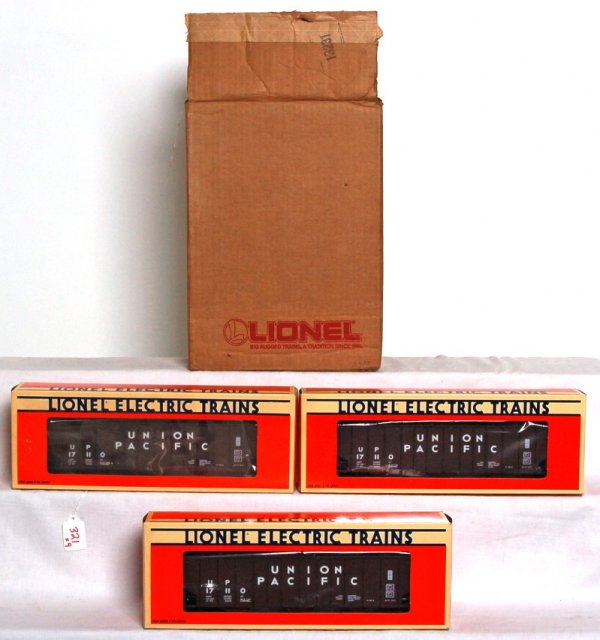 Nine Lionel 17110 U.P. 3-bay hoppers in OB: Nine Lionel 17110 Union Pacific 3-bay hoppers in original boxes, C9-10.