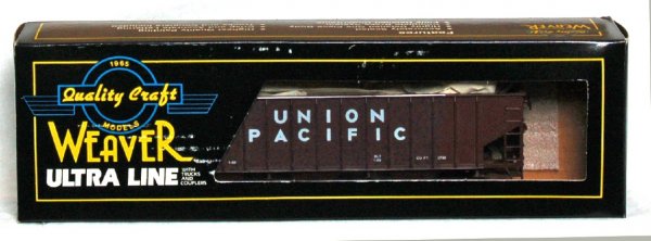Twelve Weaver U.P. and Burlington coal cars: Twelve Weaver Union Pacific (10) and Burlington (2) coal cars appearing to have never been removed from boxes, C9-10.