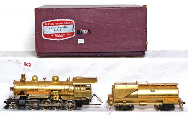 KTM Scale Models brass Union Pacific 2-8-0 in OB: KTM Scale Models No. 843 brass O scale Union Pacific 2-8-0 loco and tender in original box, train looks C8-9. Box shows very light wear.