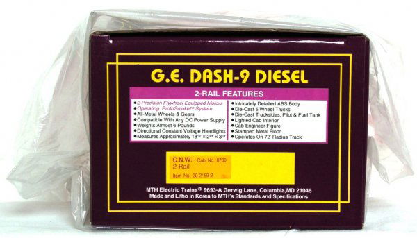 MTH 20-2159-2 C&NW G.E Dash-9 No. 8730 in OB: MTH 20-2159-2 2 rail O scale Chicago & North Western G.E Dash-9 diesel loco cab number 8730 with operating smoke unit in original box. Train appears to have never been removed from box.