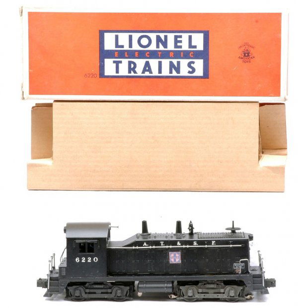 Lionel 6220 NW2 Switcher Small GM Decal MINT OB: Lionel postwar 6220 Santa Fe NW2 switcher in OB with original insert. This is the version with ten stanchions and small GM decal on lower sides near nose. Switcher has never been run, C9. OB has all f