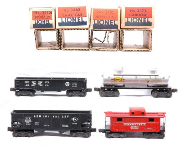 Lionel Freights 2452X 2456 2465 2472 MINT OB: Lionel postwar four freight cars; 2452X black Pennsylvania gondola, 2456 Lehigh Valley hopper, 2465 Sunoco tank car and 2472 Pennsylvania caboose all in OBs with original cardboard inserts. The gondol
