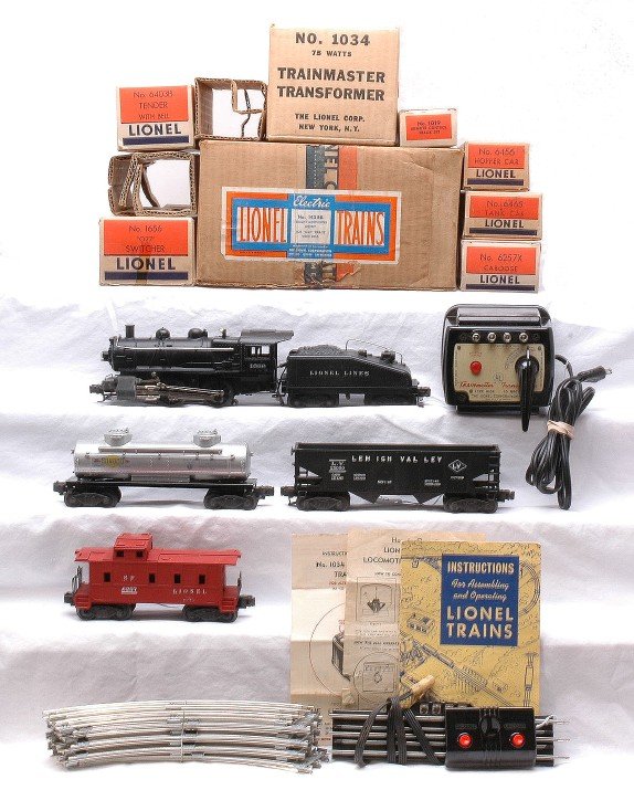 Lionel 1425B Freight Set Like New Set Boxed: Lionel postwar freight outfit no. 1425B, circa 1949, in individual OBs with original cardboard inserts and set box containing; 1656 steam switcher, 6403B tender with bell, 6456 Lehigh Valley hopper, 6