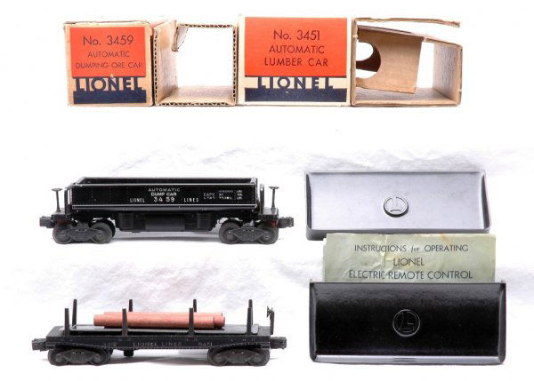 Lionel 3451 Lumber Car 3459 Dumping Ore Car LN OB: Lionel postwar 3451 rubber stamped automatic lumber car in OB with original cardboard insert, instruction sheet, three wooden logs and 160 bin. Also included is a 3459 automatic dumping ore car in OB