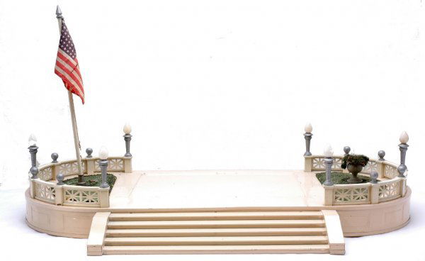 Lionel 129 Terrace Cream and Ivory Late Colors: Lionel prewar 129 terrace with late colors; cream base, ivory fences and railings and aluminum painted lamp posts. The flag pole has a nickel pedestal and aluminum painted finial. The flower urn is gr