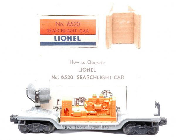 Lionel 6520 Searchlight Car Orange MINT Boxed: Lionel postwar 6520 searchlight car with orange generator in OB with original cardboard insert and instruction sheet. The car has never been run, C9-10. The box has all flaps attached and is a brick,