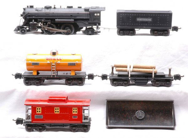 Lionel Set No. 139W 229 O2689W Freight Set: Lionel prewar O gauge freight set no. 139W, circa 1940 containing; black 229 steam loco, O2689W tender, 3651 lumber car with 160 bin, 2654 orange Shell tank and 2657 caboose. Loco is missing one jewel