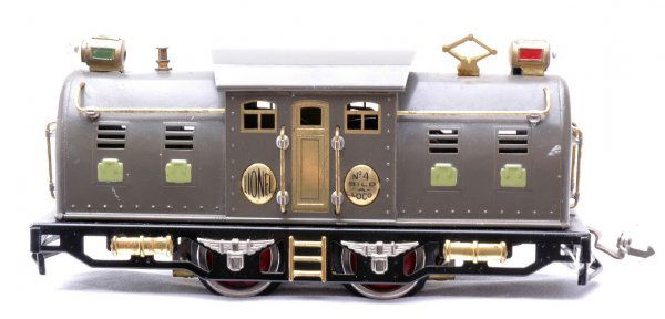 Lionel 4 Gray Electric 0-4-0 with Bild-A-Loco: Lionel prewar O gauge 4 gray electric 0-4-0 with Bild-A-Loco motor. The loco has a black frame, brass trim and pea green hatches, C7.