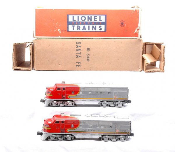 Lionel 2343 Santa Fe F3 AA Diesels Boxed: Lionel postwar 2343 Santa Fe F3 AA diesels in OBs with original cardboard inserts. The diesels are C6. The OBs are worn and the dummy A box has tape.