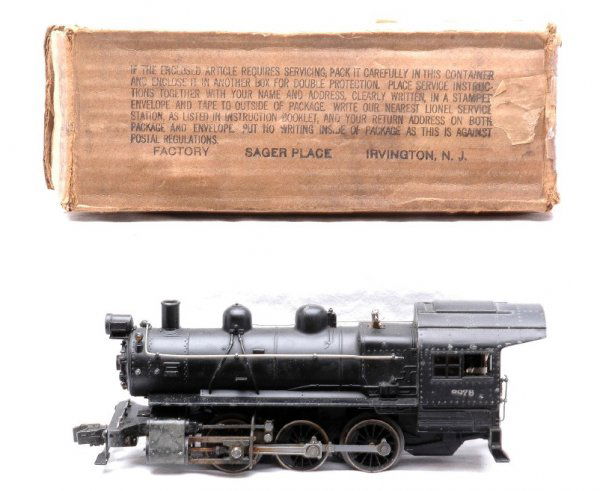 Lionel 227 Semi Scale 0-6-0 Switcher Boxed: Lionel prewar O gauge 227 semi scale 0-6-0 switcher in OB. The loco has an incorrect postwar coupler installed in the front. Loco is C6. The OB is worn with tape repair.