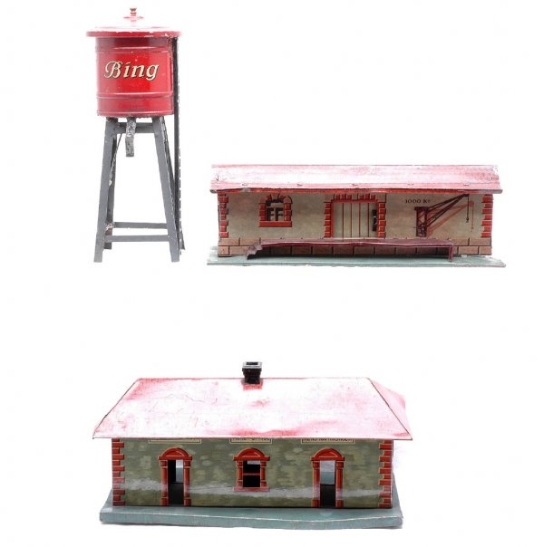 Bing Water Tower Waiting Station Freight Station: Bing prewar accessories; red water tower with black water spout and ladder and gray structure, waiting station with ticket office and freight station. The freight station is missing one end. All acces