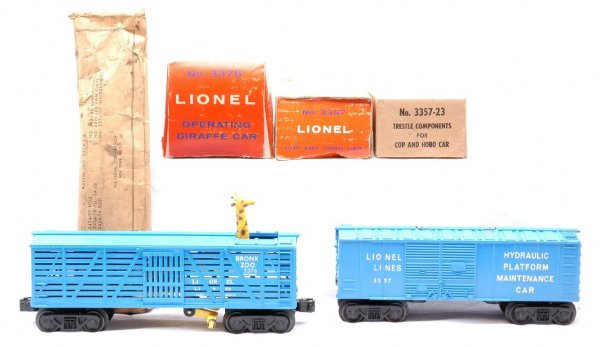 Lionel 3376 Giraffe 3357 Hydraulic Like New Boxed: Lionel postwar 3376 blue operating giraffe car with white lettering and 3376-118 factory packet in OB. Car is C8. The factory packet is soiled. OB has display panel and push in tab intact and three fl