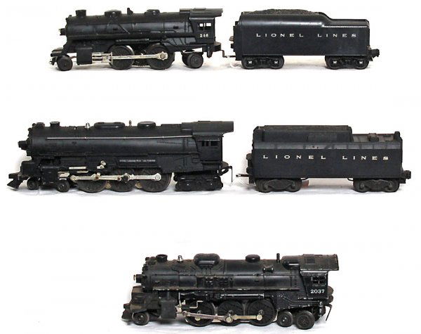 Lionel 2037, loco, 246, two tenders: Lionel 2037 2-6-4 loco, unnumbered 4-6-4 loco, 246 2-4-2 loco and two unnumbered tenders, one has a whistle, C6-7. Unnumbered loco is factory painted and probably a factory error, maybe a 685 or 2055.
