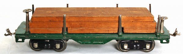 Lionel 511 standard gauge flatcar w/lumber load: Lionel 511 standard gauge flatcar with lumber load, one brake wheel has been solder repaired, C6+.