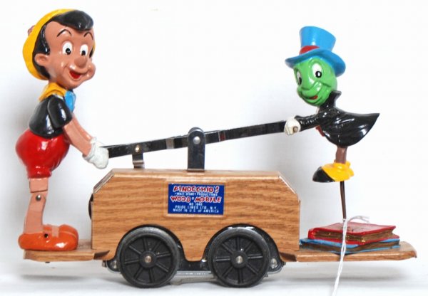 Pride Lines PinocchioÕs Wood Mobile hand car: Pride Lines PinocchioÕs Wood Mobile hand car, looks C9, graded C8 due to having been run lightly.