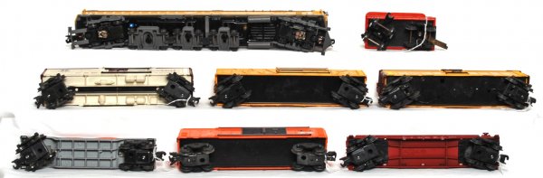 Lionel 3672, 1882T, 6511, 6561, 6468-25, more: Lionel 3672 Bosco car with platform and three non-magnetic milk cans, 1882T The General tender, 6511 flatcar, 6561 cable reel car, 6468-25 New Haven double door automobile car with incorrectly attache