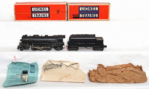 Lionel 2026 loco and 6466WX tender in OB: Lionel 2026 loco and 6466WX tender in original boxes with inserts, C7 area. Partial sheet of original wrapping paper, original instructions sheets and a bottle of smoke pellets, Loco box is missing in