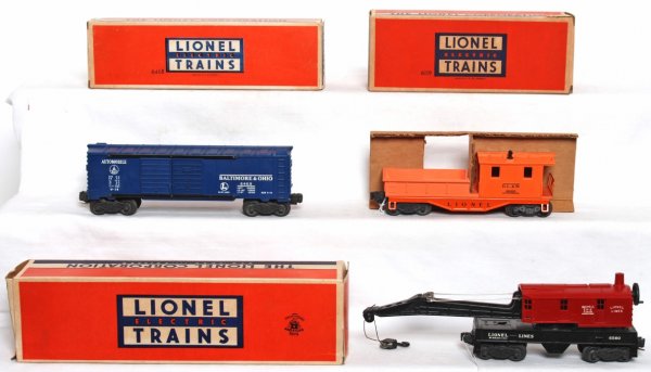 Lionel 6468, 6560-25, 6119-25 in OB: Lionel 6468 Baltimore and Ohio automobile car, 6560-25 operating work crane with hairline at rear cab mount and unrun 6119-25 D.L.&W. work caboose in original boxes, C8. Boxes look C8 area. 6119 has a