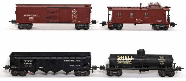 Lionel prewar 2954, 2955, 2956 and 2957: Lionel prewar semi scale train set including X2954 Pennsylvania boxcar, 2955 Shell tank car, 2956 Baltimore and Ohio and 2957 NYC caboose. No warping on cars, original paint. C6-7.