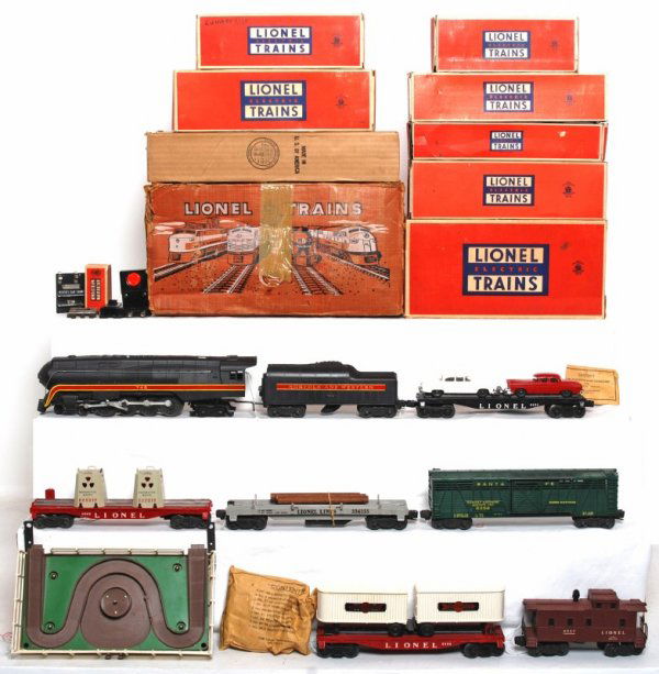 Lionel boxed 2521WS set with 746 N&W J: Lionel set 2521WS with a set box that has all of the flaps but is worn. Trains include 746 Norfolk and Western J, 746W short stripe tender, 6805 atomic energy disposal car, 6430 trailer flat car, 6424