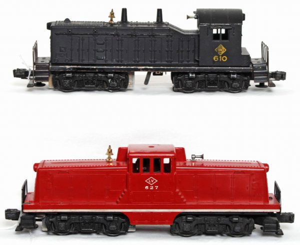 Lionel 610 Erie and 627 LV switchers: Lionel 610 Erie NW-2 diesel switcher and 627 Lehigh Valley GE 44 ton diesel switcher, 610 has crack at screw, C6.