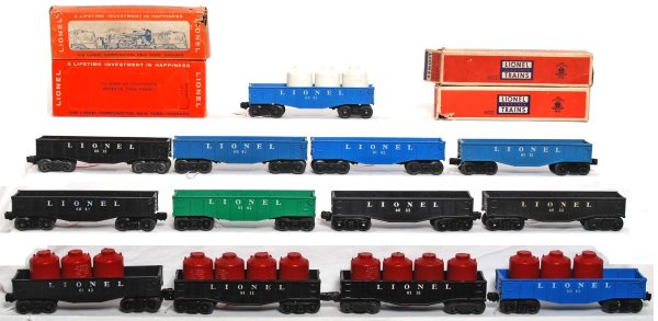 Thirteen various Lionel gondolas, some boxes: Thirteen various Lionel gondolas, some boxes, some loads. Most if not all are different variations of each other. 6012, two 6032, four 6042 one with three red canisters and one with three white canist
