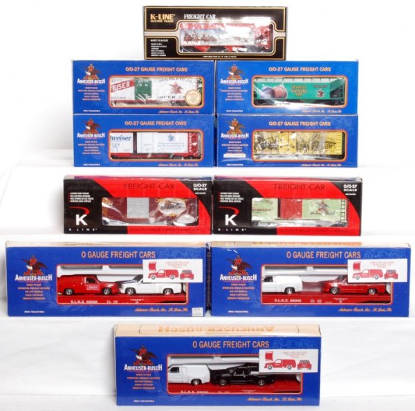 Ten K-Line Anheuser-Busch freight cars in OB: Ten K-Line Anheuser-Busch freight cars in original boxes, C9-10. K-625902 1997 Christmas hopper, K641-5603 Clydesdales Holiday boxcar, K641-5602 2001 Christmas boxcar, K642-5604 beer reefer, K621-5602