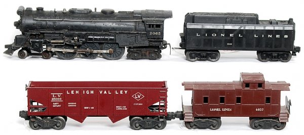 Lionel 2065 4-6-4, 234W, 6456 and 6037: Lionel 2065 4-6-4 loco and 234W tender with 6456 Lehigh Valley hopper and 6037 caboose, loco is missing one pilot step and tender is missing one step, otherwise C6 area.