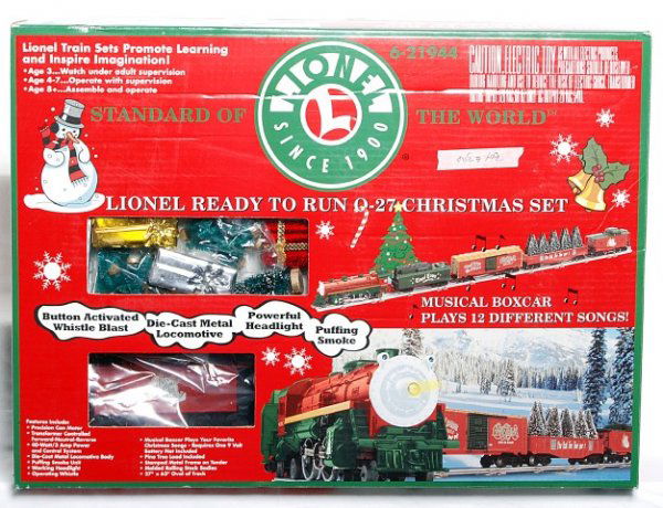 Lionel 21944 O-27 Christmas Set in original box: Lionel 21944 Ready to Run O-27 Christmas Set in original box, rains look C9 area, but graded C8 due to having been run. set consists of: 3766 2-4-2 loco and Tinsel Town Express tender, 9700 Holiday Wi