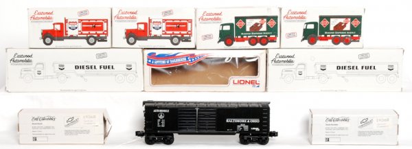 Six Eastwood automobilia, two Ertl, one Lionel : Six Eastwood automobilia trucks, two Ertl trucks, one Lionel 9210 Baltimore and Ohio double door automobile car, all in original boxes, C8-10.