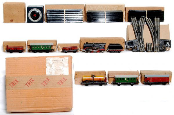 Trix Express boxed HO set, loco, freight, pass.: Trix Express HO scale freight / passenger train set in original boxes. Set overall looks C6 area. loco is missing cab steps on one side and one gondola is missing an axle. 20 0 52 0-4-0 loco and tende