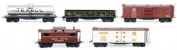 Trix Twin Railroad, five HO scale freight cars: Trix Twin Railroad HO scale freight cars, C6-7. 1684 gondola, 3688 Texaco tank, 20686 reefer, 37685 boxcar and 482690 caboose.